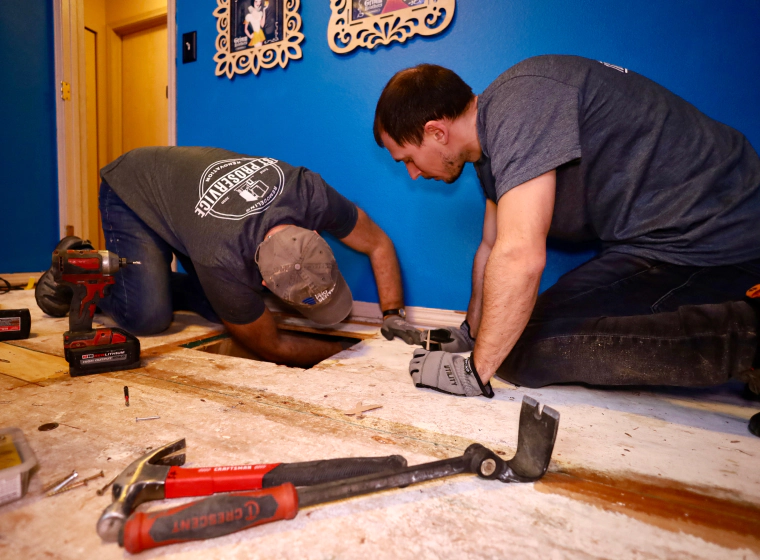 contractors fixing a floor